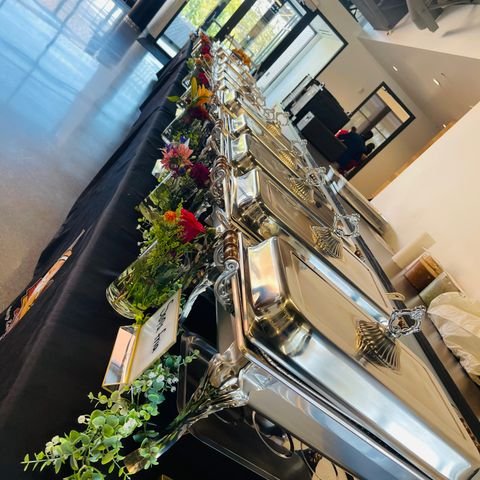 Buffet line prepared by Nelly's Kitchen & Catering for an event